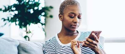 woman looking at a mobile phone