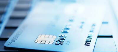 a credit card on a keyboard