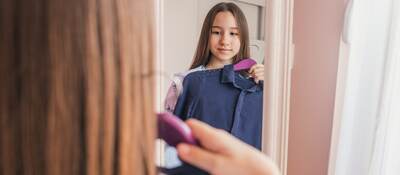 Girl chooses a dress