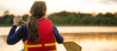 Woman wearing personal flotation device