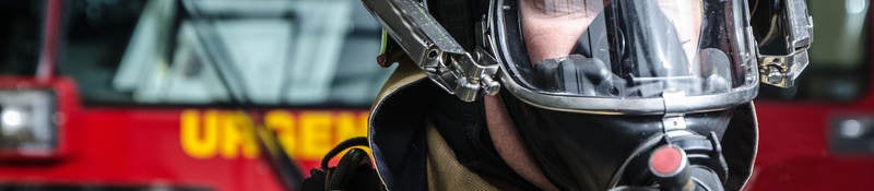 Fireman with breathing mask close up