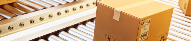 Cardboard boxes on conveyor belt 
