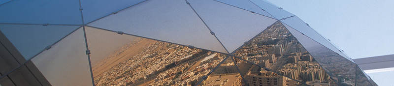 Glass prism reflecting city of Saudi Arabia