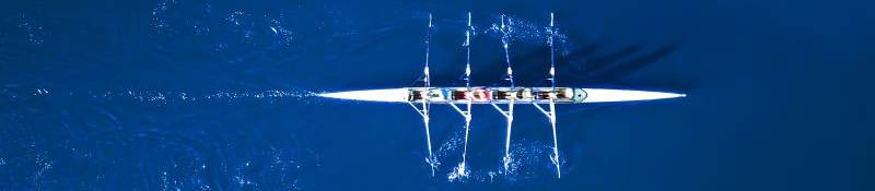 rowing team on river