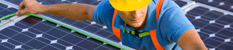 Man measuring solar panels