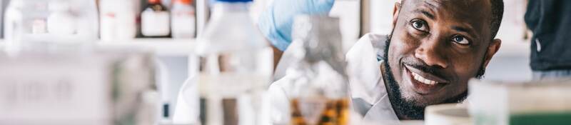 Chemist looking at sample