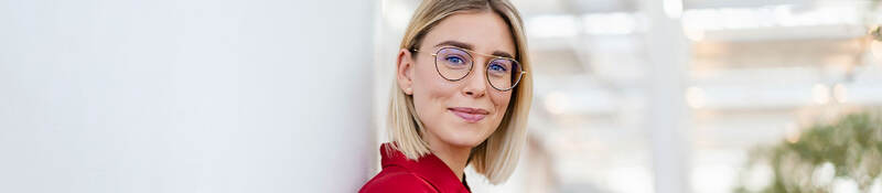 A photo of a young, smiling person