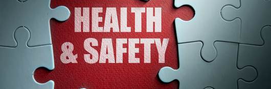 Missing pieces from a jigsaw puzzle revealing health and safety