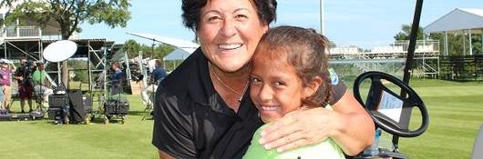 Nancy Lopez with unnamed girl at Lake County Golf Course