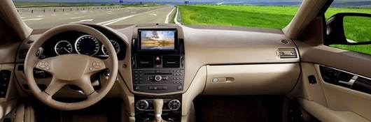 , interior shot of a car's infotainment system, center console of car