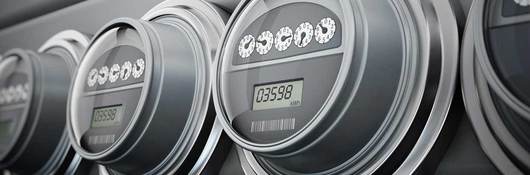row of gray electric meters