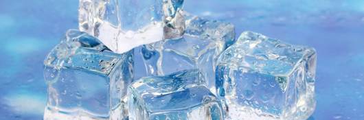 Ice on bright blue background
