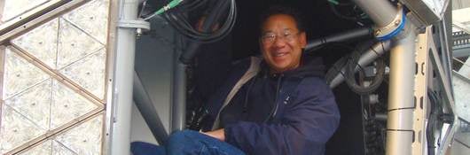 Jimmy Wong having fun by climbing inside the Times Square Ball while its construction was nearing completion