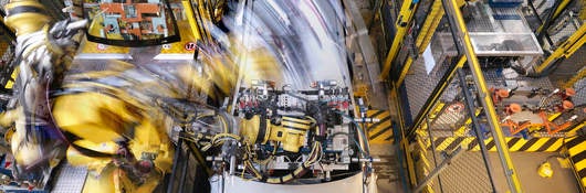 The nexus of innovation and safety - overhead shot to car on assembly line