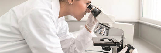 Scientist with Microscope