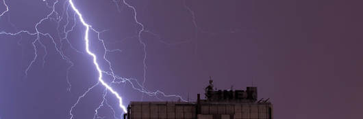 Lightning striking building