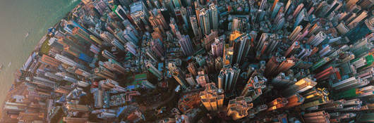 Aerial view of city with tall buildings