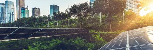 A photo voltaic panel sits to the right of skyline views