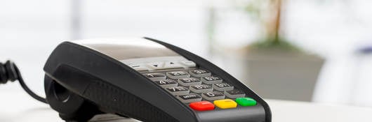 chip-enabled credit card in a card payment reader terminal