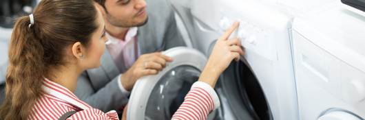 People looking at appliances