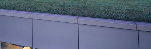 An innovative office building with greenscape on the roof.
