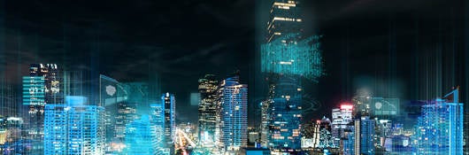 Modern city illuminated at night