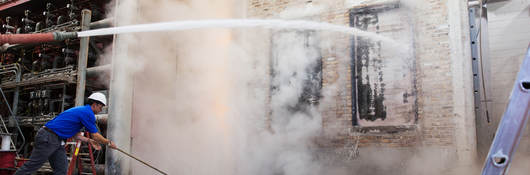 Hose stream testing for impact on fire door