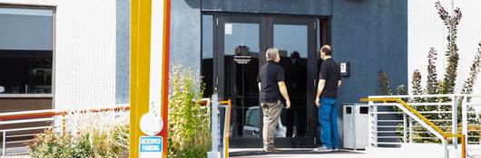 Two code authorities entering a building