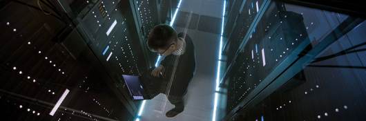 Top down view of man working in a data center 