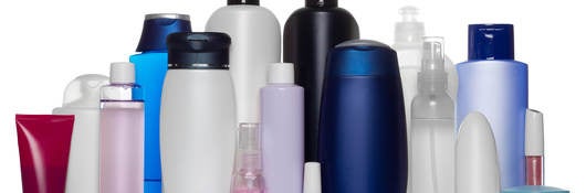 Cosmetic bottles on stand 