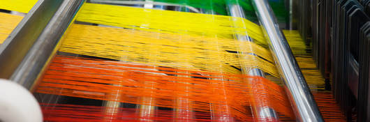 Colored thread in a textile factory