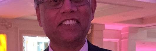 Headshot of Iqbal
