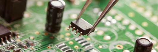 Close up image of the internal components of a circuit board.