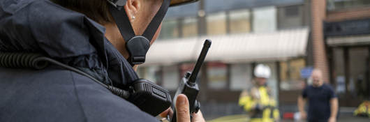 Firefighter with radio communication device