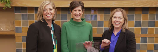 Jennifer Scanlon and others with an award