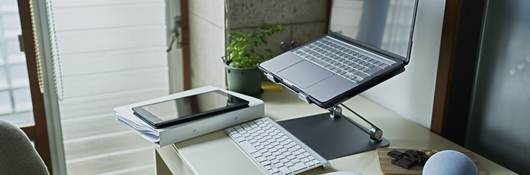 Home office setup with smart speaker.