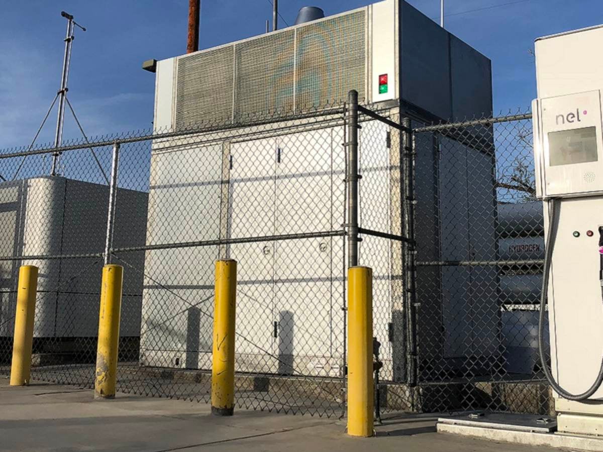 hydrogen fuel tank surrounding by fenced in cooling tanks
