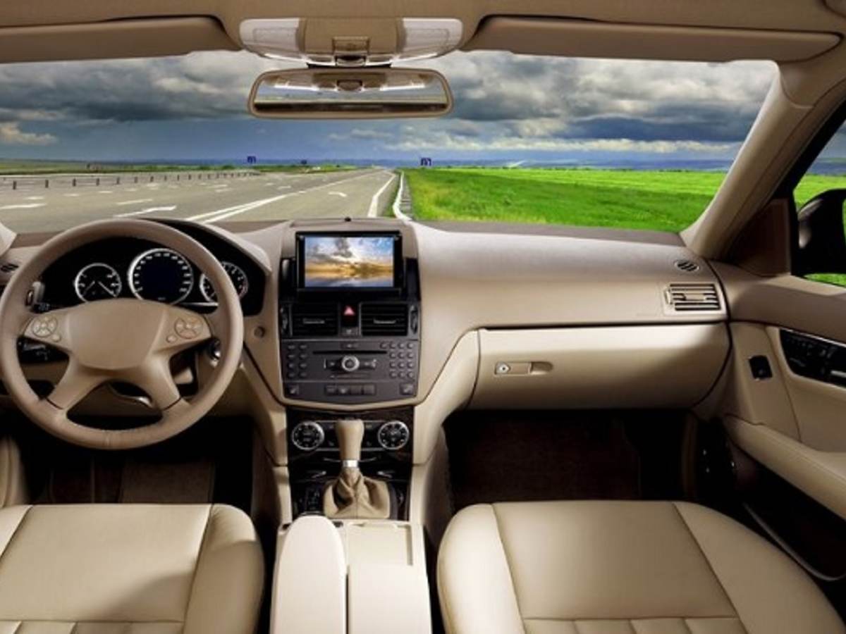 , interior shot of a car's infotainment system, center console of car