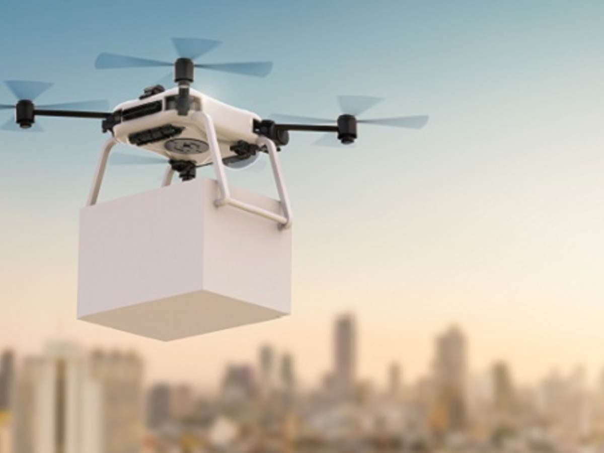 3d rendering delivery drone flying with cityscape background, Hovering drone that takes pictures of city sights