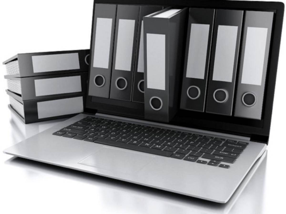 archive concept. laptop and files on isolated white background