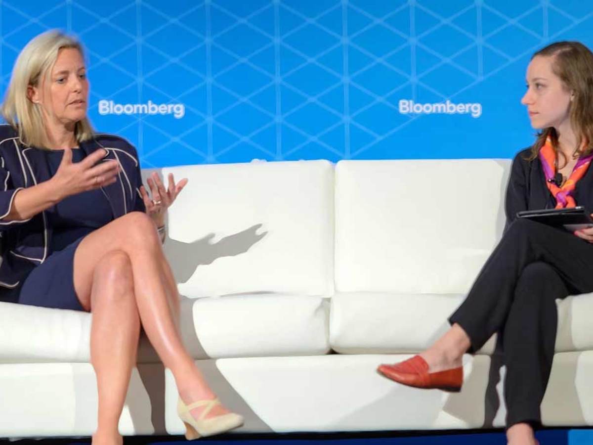 Gitte Schjøtz, president of UL’s Software division., discusses sustainability from a white sofa at the Bloomberg Summit