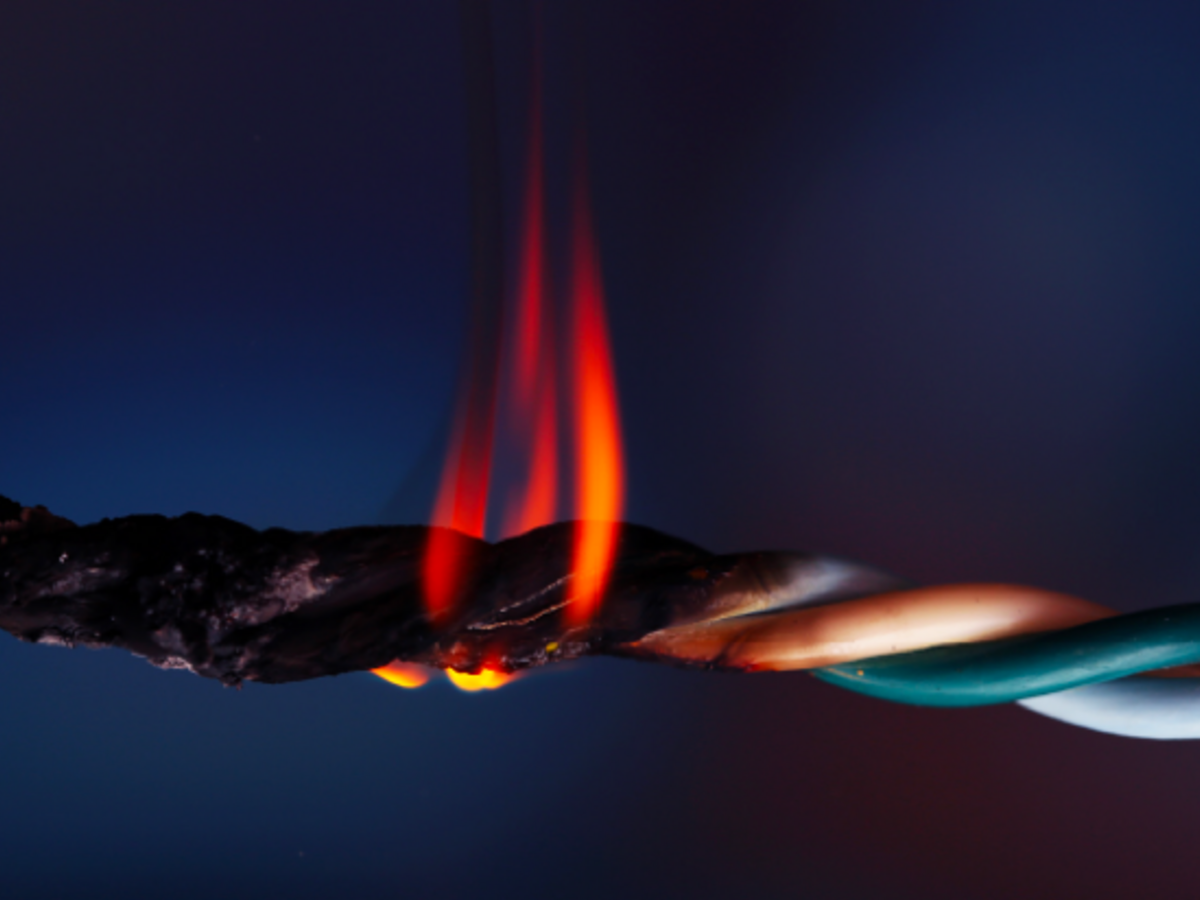 Close up of wire cable that is burning