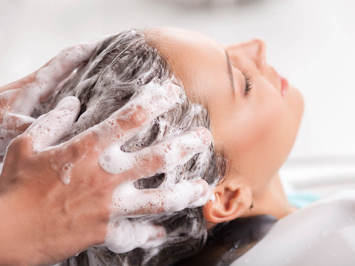 Woman’s hair being shampooed