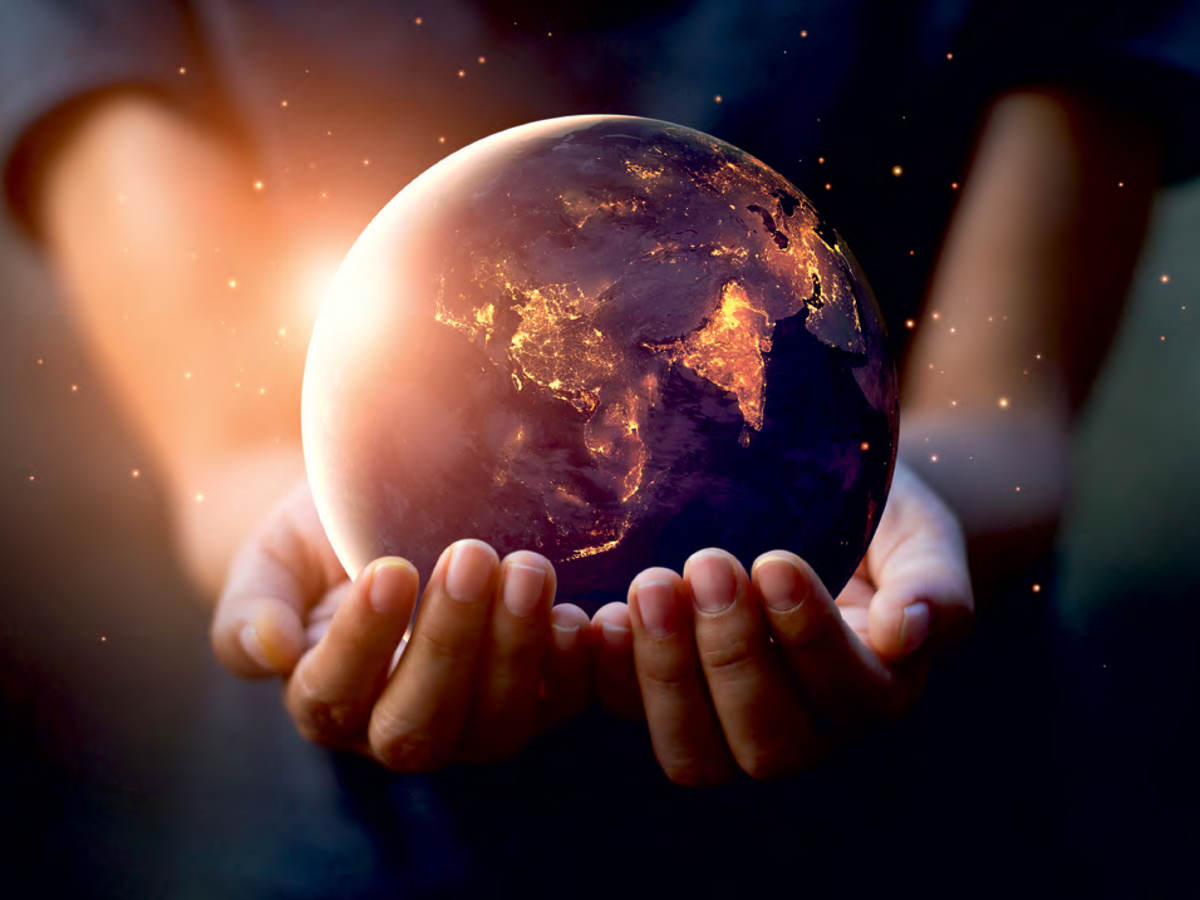 Hands holding globe