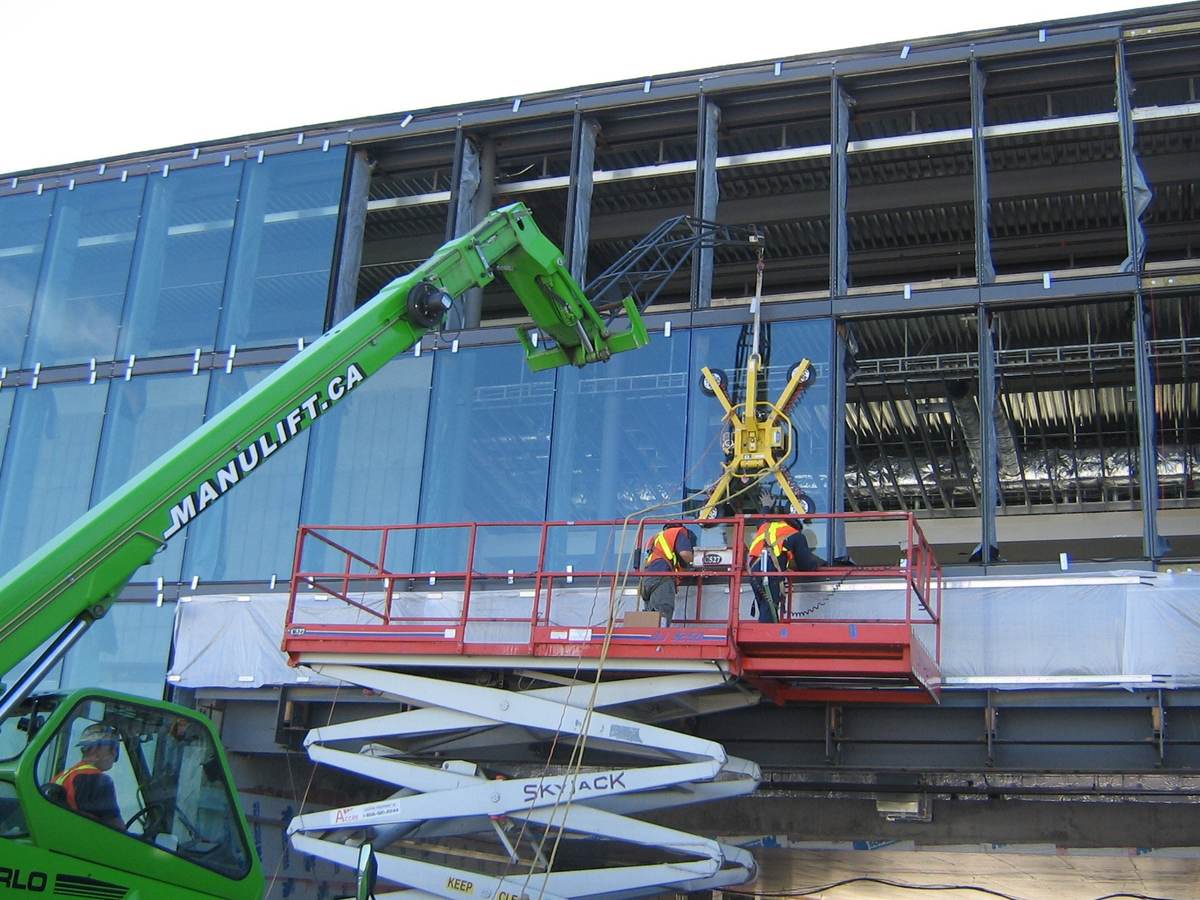 Crane installing windows