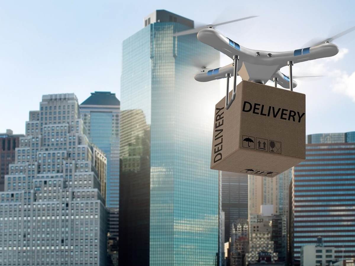 Drone attempts to deliver package in city landscape.