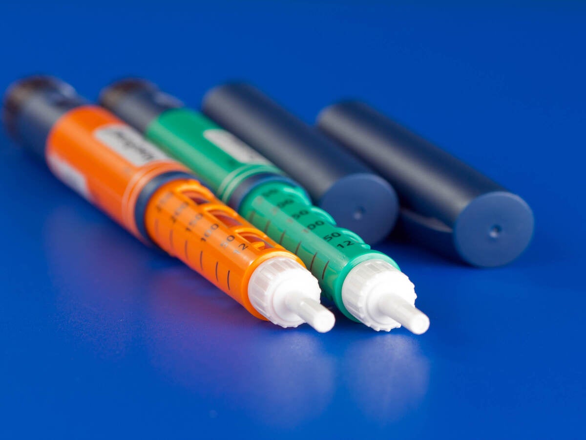 image of colorful syringes used for dispensing pharmaceuticals