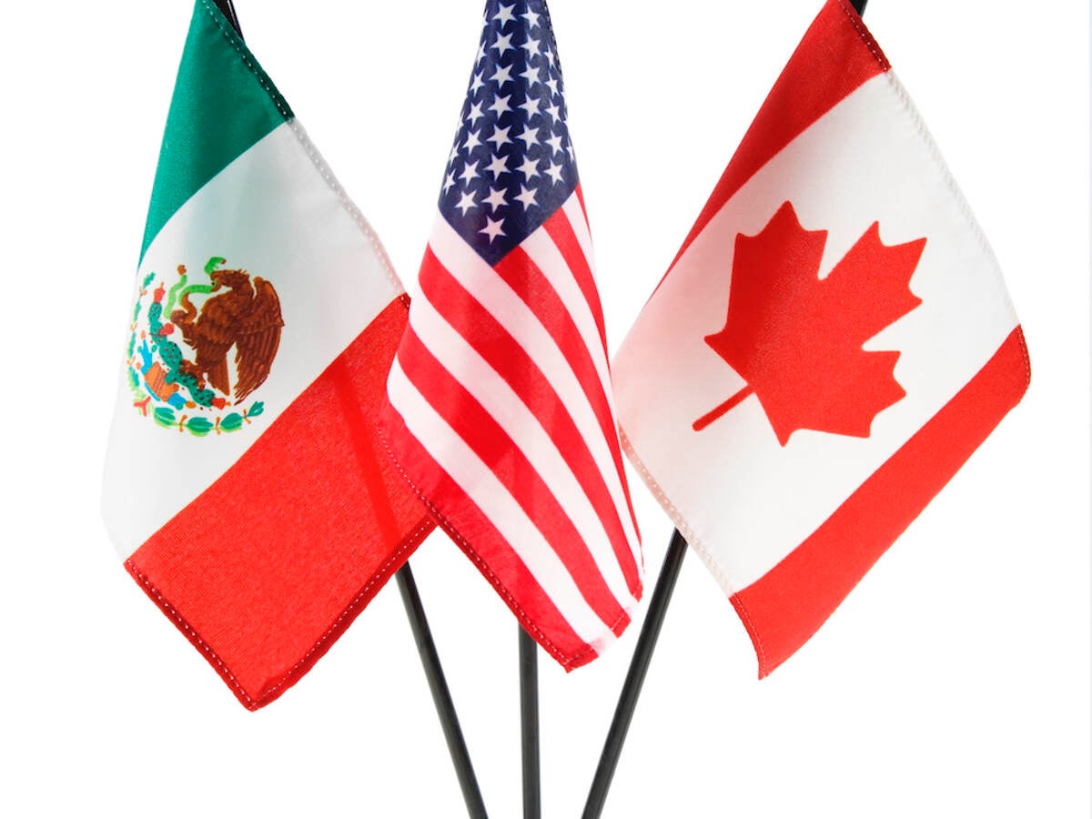 A trio of flags -- Mexico, United States and Canada 