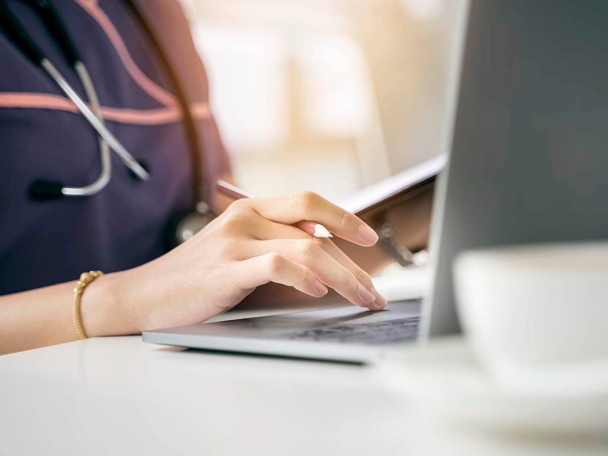 nurse using a laptop