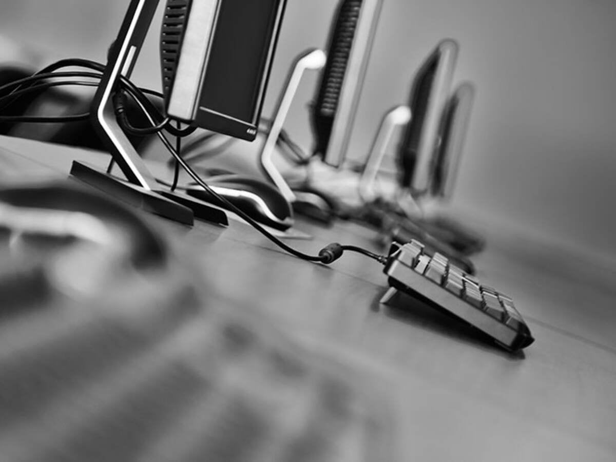 photo of laptops and monitors
